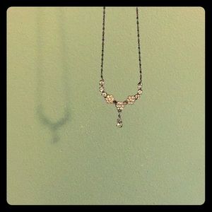 Vintage, simple, flower-shaped, teardrop necklace.